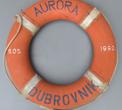 Kolut za spašavanje s motornog broda »Aurora«, 20. stoljeće, pluto, tkanina, plastificirana; uže promjer 75 cm; DUM PM 3185