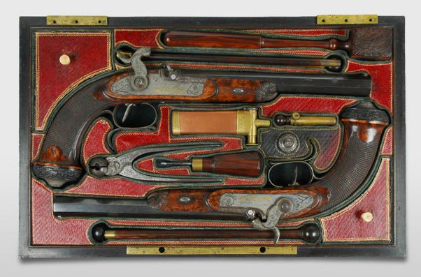 Set of duelling pistols with accoutrements